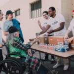 Volunteers distribute meals, bringing nourishment and smiles to individuals